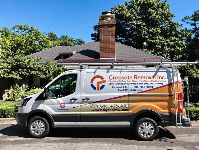Bell Chimney Sweep technician removing creosote safely in Bell, CA
