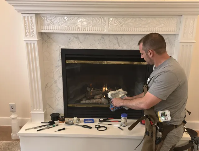Bell Chimney Sweep performing fireplace maintenance in Bell, CA